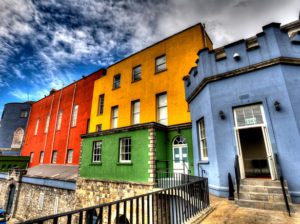 Vibrant red, orange, blue and green buildings in an international location