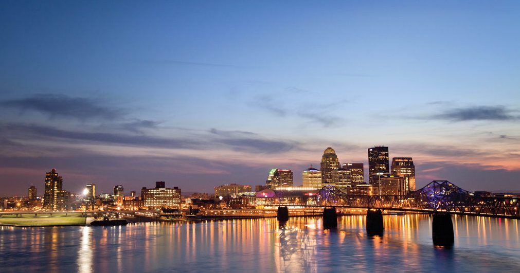 Downtown Louisville skyline at night over the Ohio River