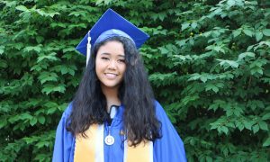 2019 Spalding grad in cap and gown