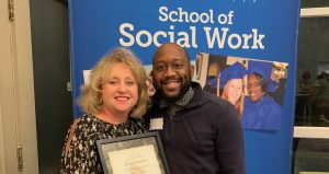 Spalding Social Work Chair Shannon Cambron and Office of Safe and Healthy Neighborhoods official Joshua Watkins