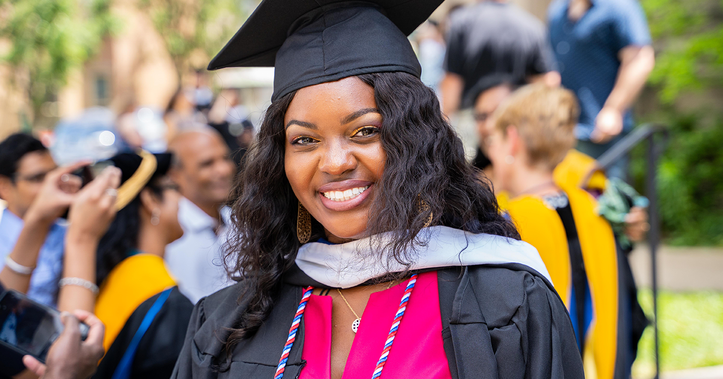Graduate Student in Cap and Gown at Commencement