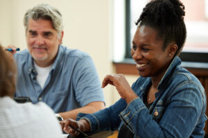 Two faculty members from the Naslund-Mann Graduate School of Writing during a meeting