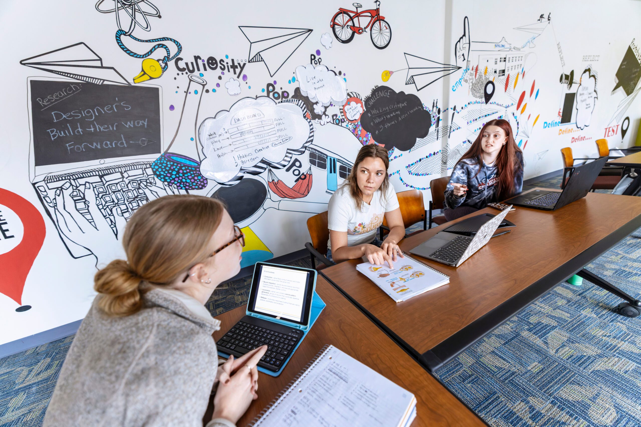 students in classroom having a discussion