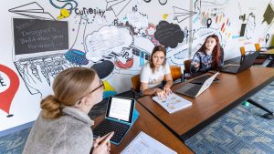 art classroom students on laptops