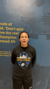 Female Spalding student athlete in long sleeve shirt